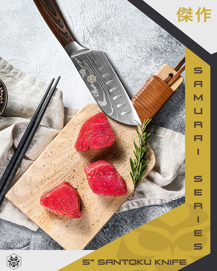 The Samurai 5" Santoku with chunks of red tuna sushi, black pepper, rosemary, and chopsticks