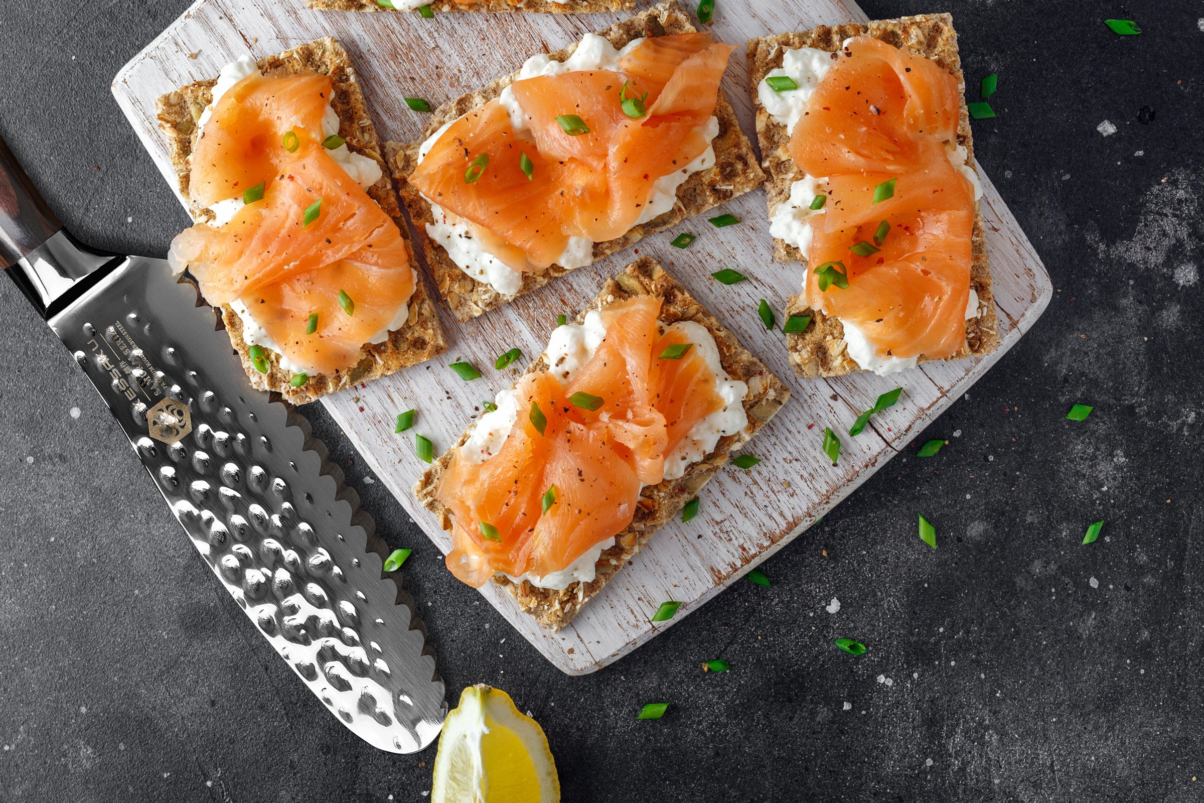 The Samurai Serrated Sandwich Spreader after slicing lox to put atop cream cheese on crackers.