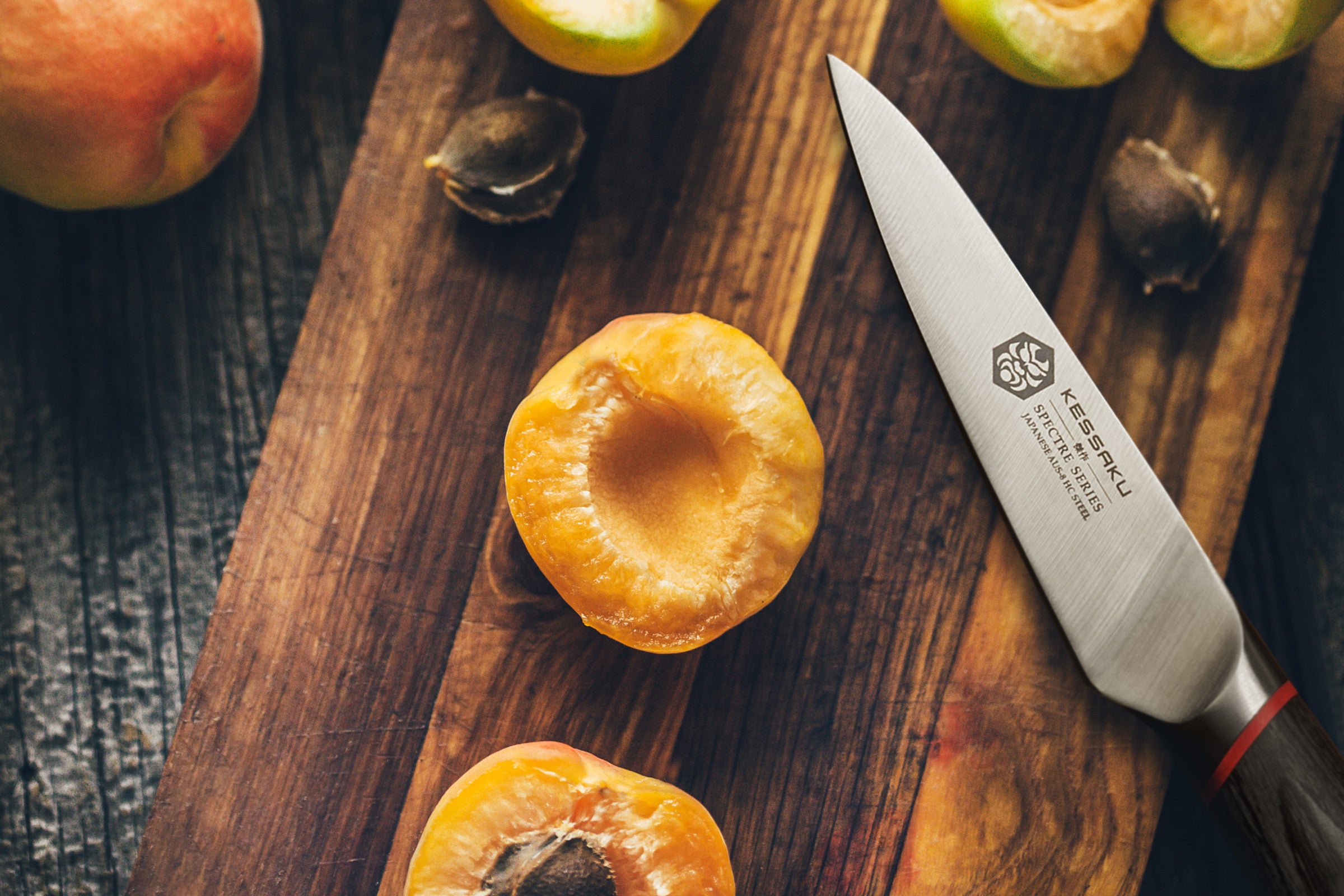 The Spectre Paring Knife after slicing and pitting peaches.