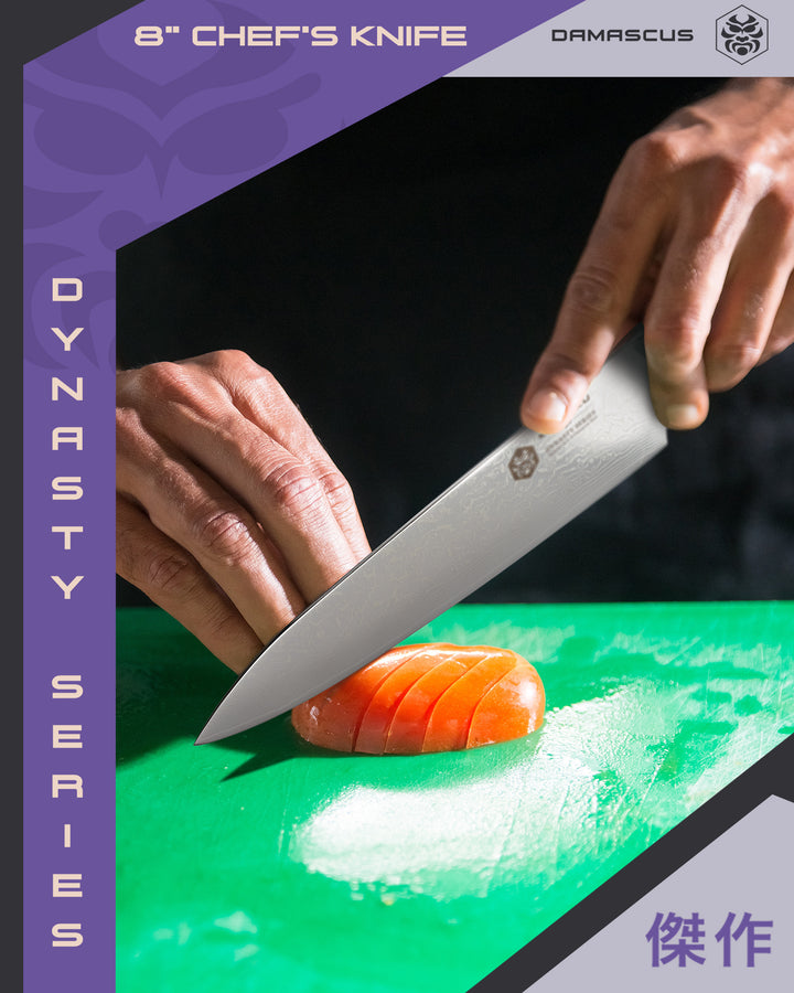 A man sliced a tomato into equal piece with the Damascus Chef's Knife