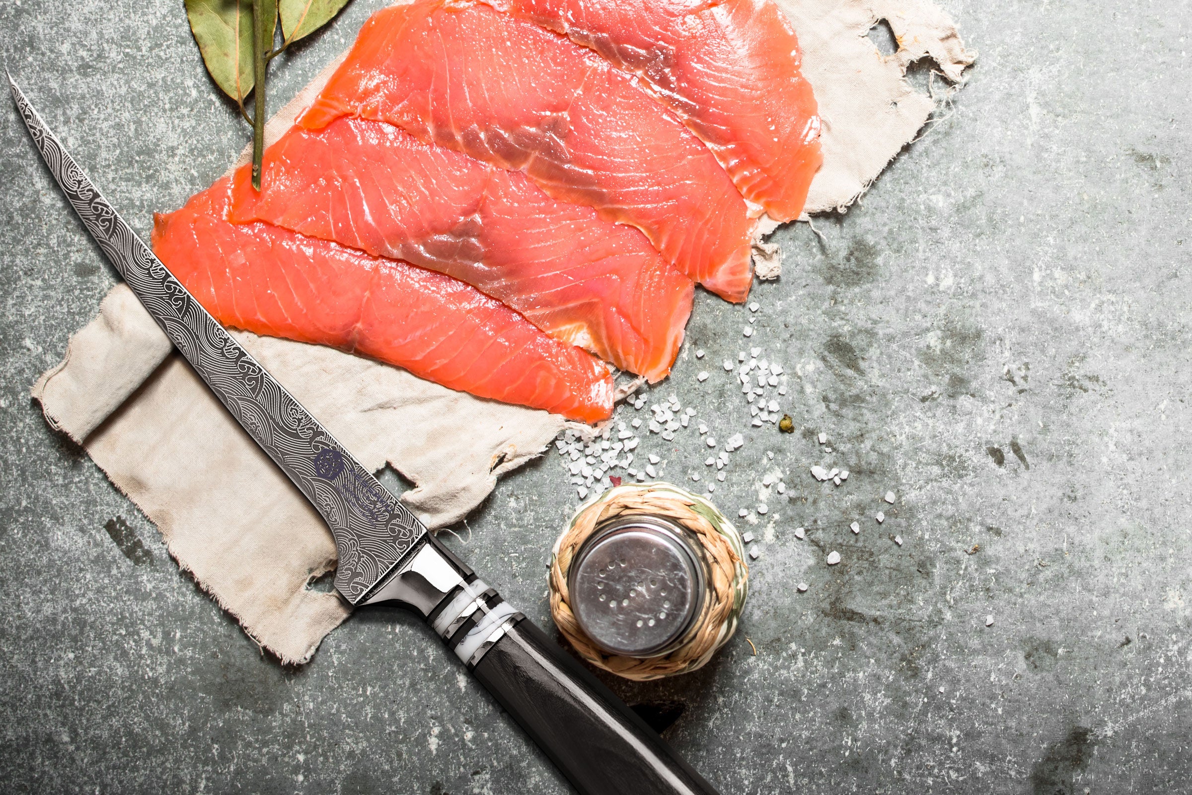 The Ronin FIllet knife with very thin slices of fish, and seasoning