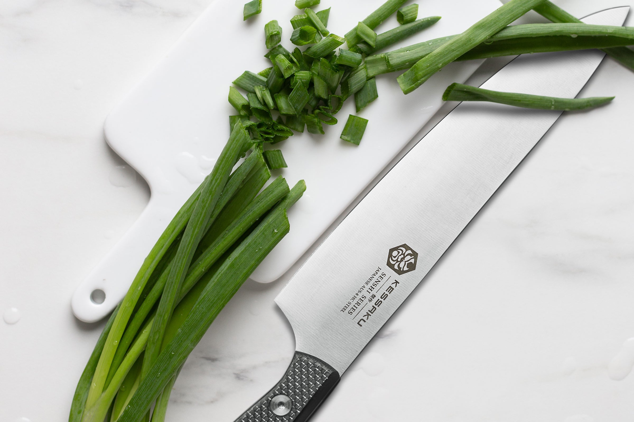 The Senshi Chef's Knife with diced green onion