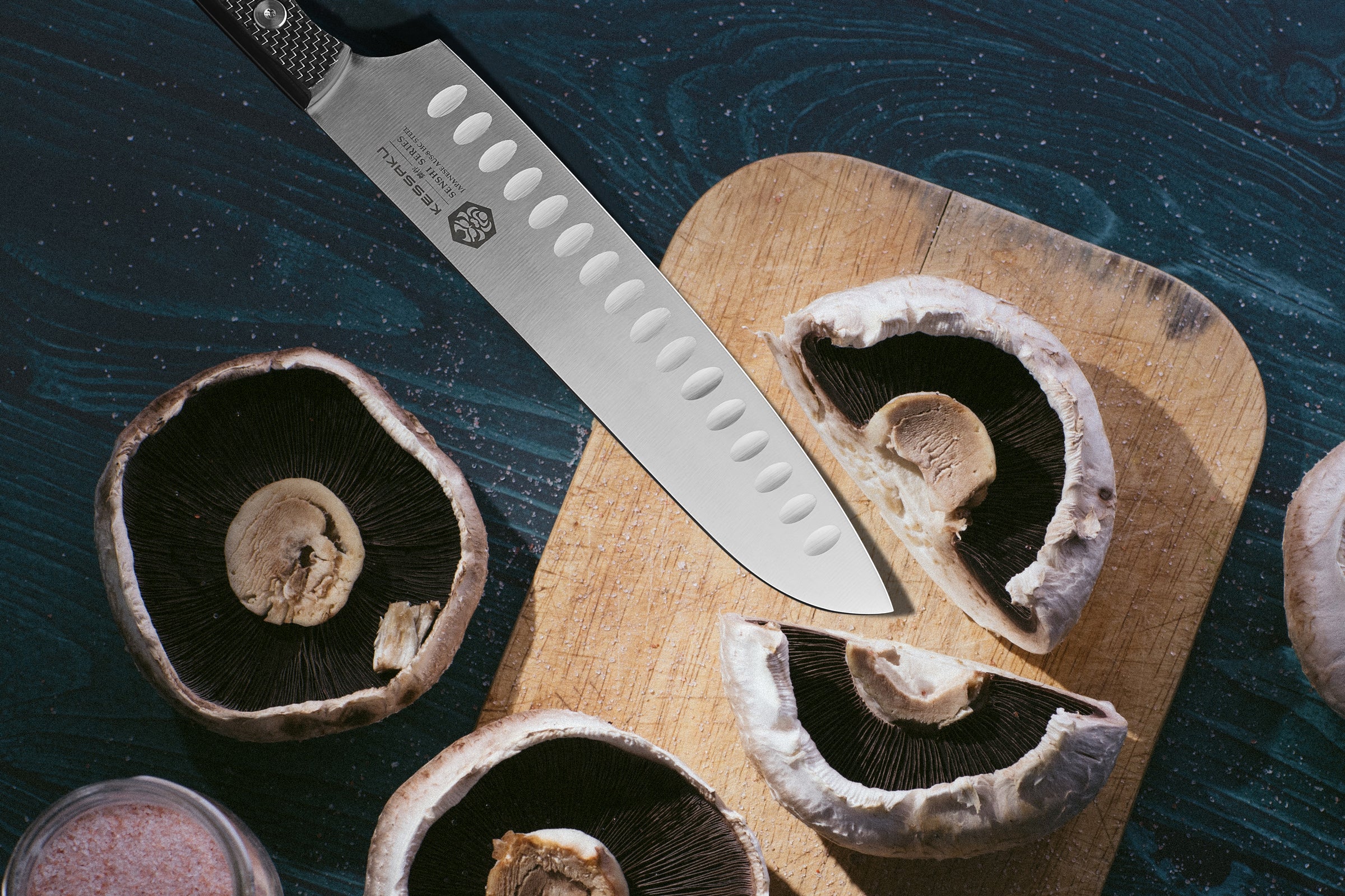 The Senshi Santoku slicing Portobello mushrooms.
