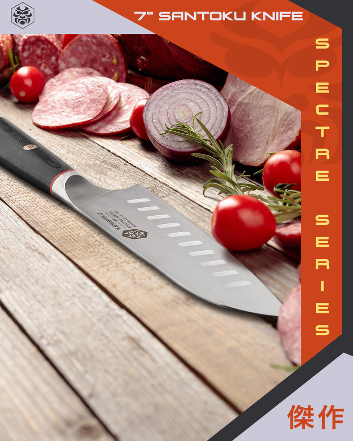 The Spectre Santoku Knife with red onions, ham, cured meats, cherry tomatoes, and rosemary.