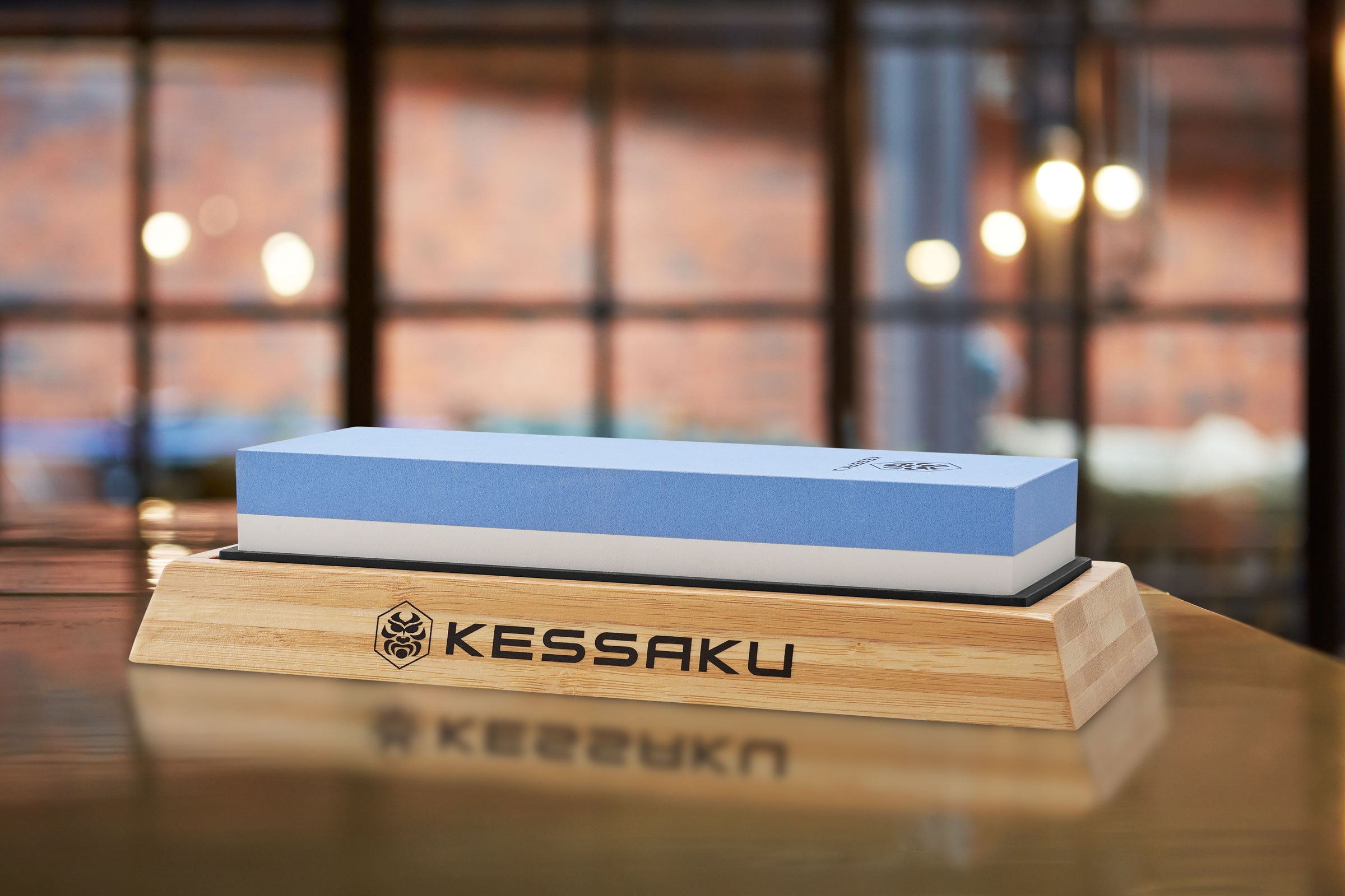 The Kessaku Double-Side Whetstone Kit on a kitchen island.