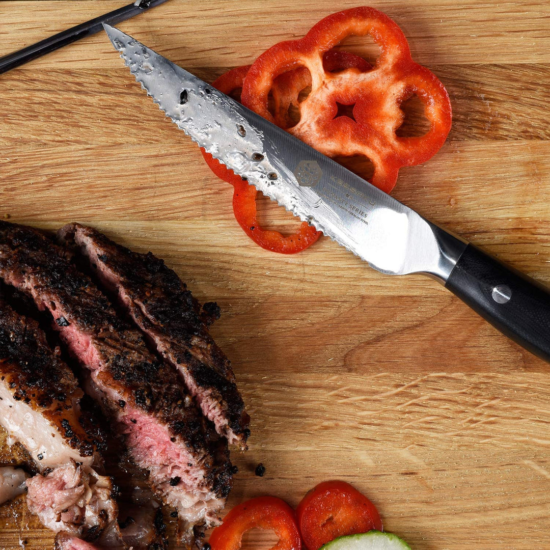 The Dynasty Steak Knife with sliced steak, peppers, cucumber