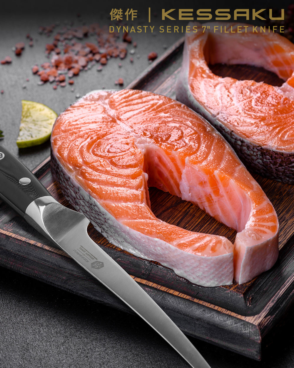 Perfectly trimmed salmon steaks, a slice of lemon, and the Dynasty Fillet Knife
