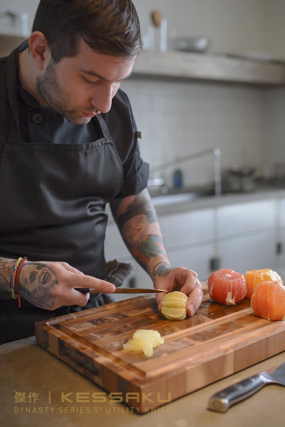 A chef makes a unique design with a lemon