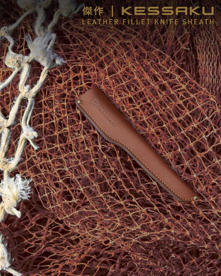 The Kessaku Leather Knife Sheath lays on a large, deep sea fishing net.